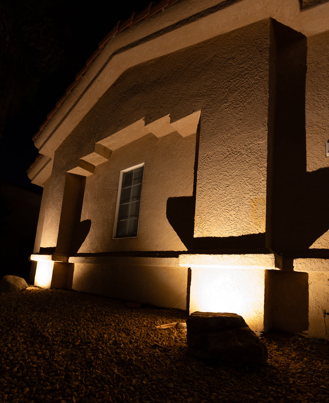 Building exterior with illuminated walls at night